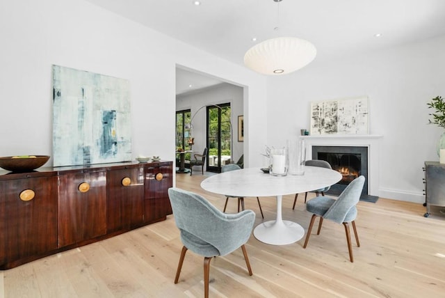 dining room with light hardwood / wood-style floors