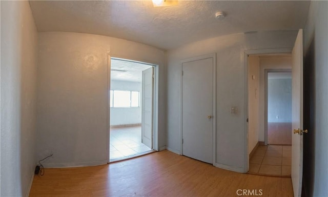 unfurnished room featuring light hardwood / wood-style floors