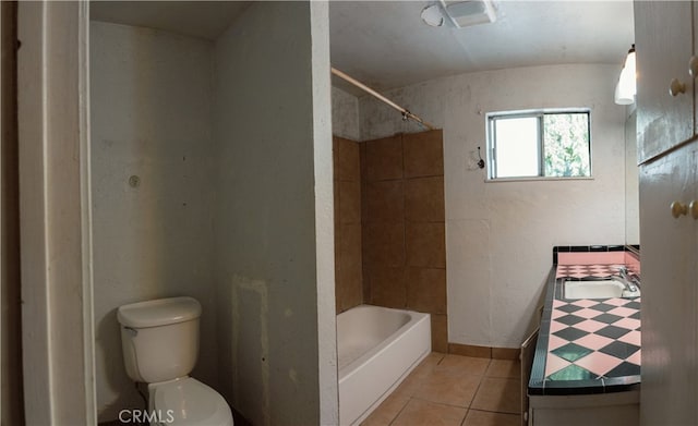 full bathroom with toilet, tile patterned floors, shower / washtub combination, and vanity