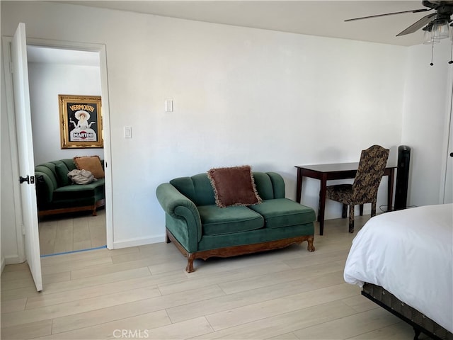 bedroom featuring ceiling fan and light wood-type flooring