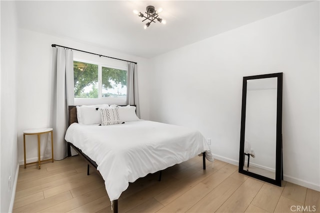 bedroom featuring light wood-type flooring