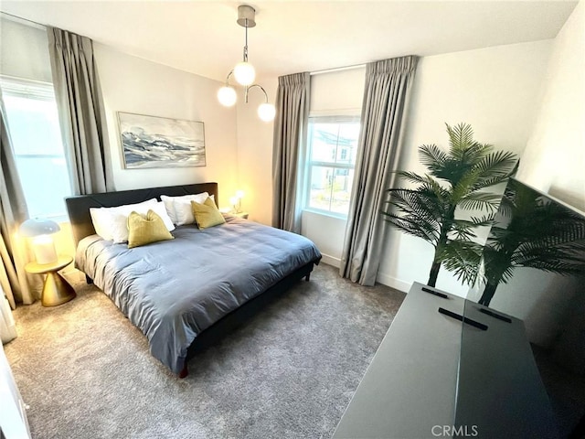 bedroom with dark carpet