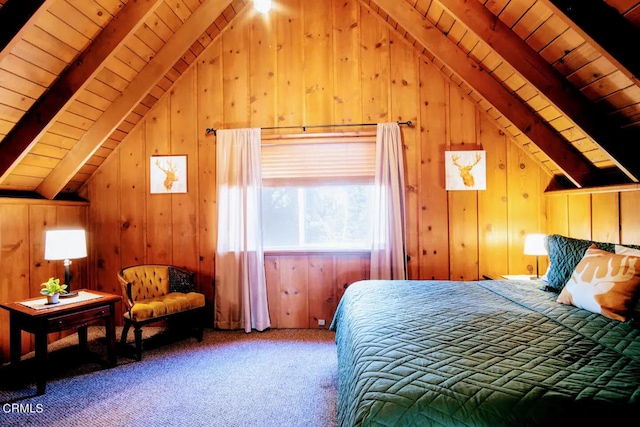 carpeted bedroom with wooden walls and vaulted ceiling with beams