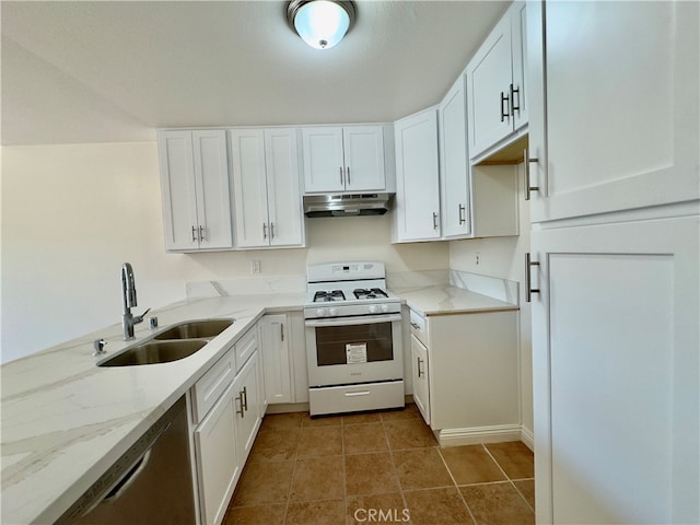 kitchen with light stone counters, sink, white cabinetry, dishwasher, and white gas stove