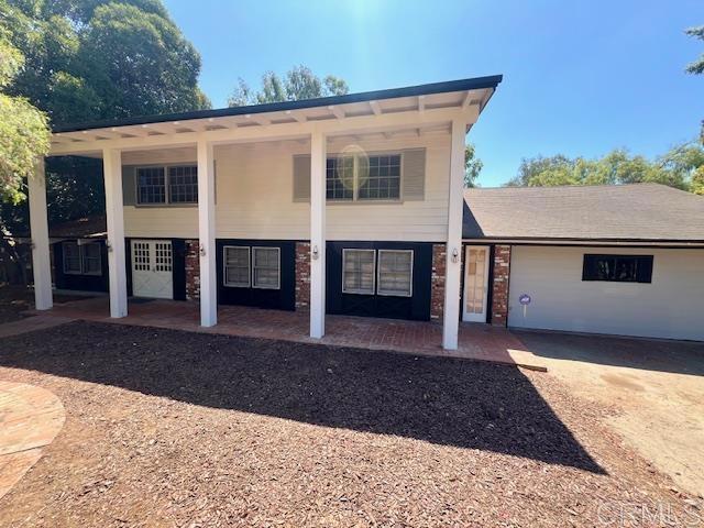 view of front of property with a patio