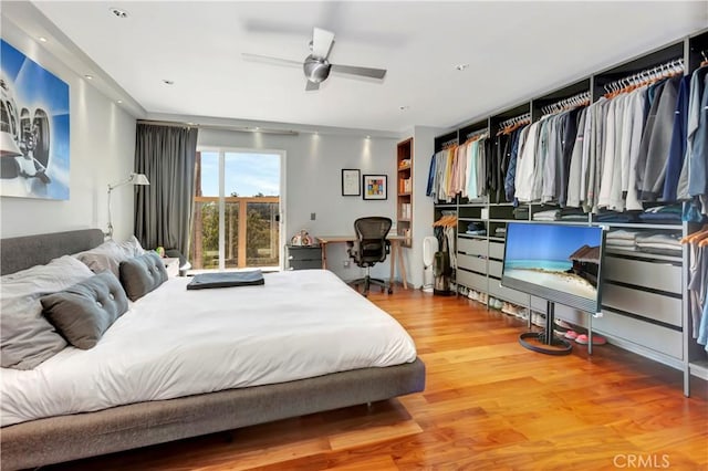 bedroom with wood finished floors