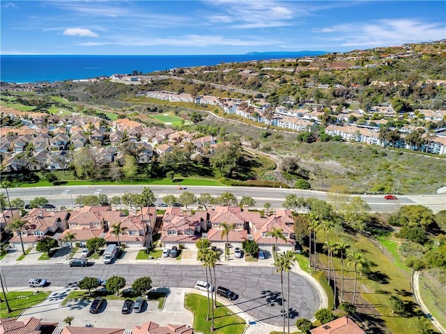 aerial view with a residential view and a water view