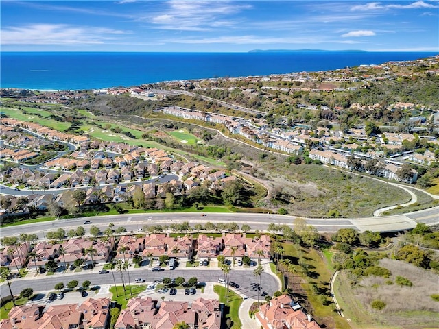 aerial view with a residential view and a water view