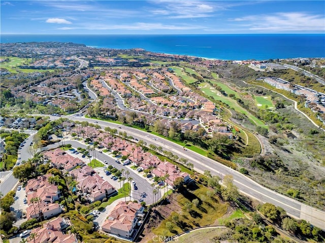 birds eye view of property featuring a residential view and a water view