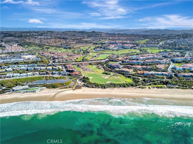 bird's eye view featuring a beach view and a water and mountain view