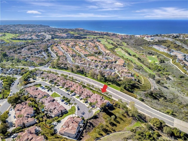 bird's eye view with a residential view and a water view