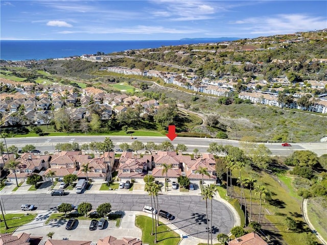 bird's eye view featuring a residential view and a water view