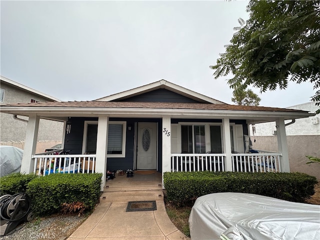 bungalow-style house featuring covered porch