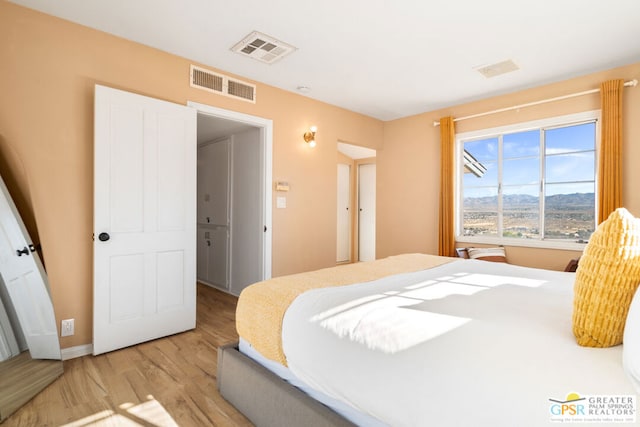 bedroom featuring light hardwood / wood-style flooring