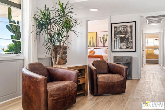 living area featuring light hardwood / wood-style floors