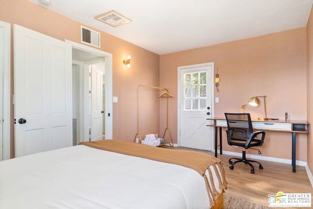 bedroom with light wood-type flooring