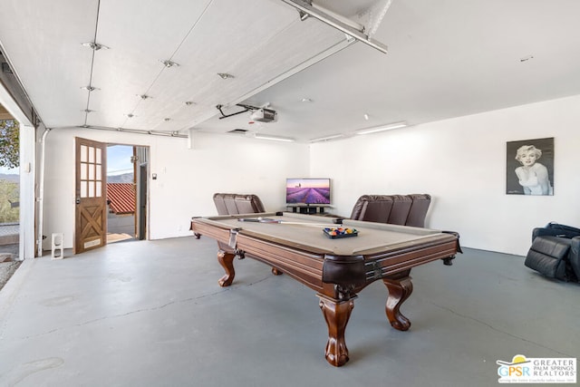 playroom featuring concrete floors and pool table