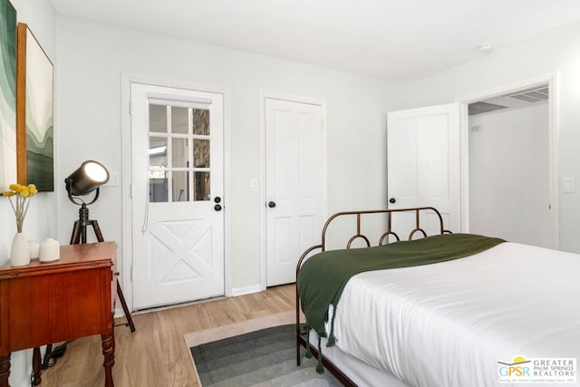 bedroom featuring light hardwood / wood-style floors