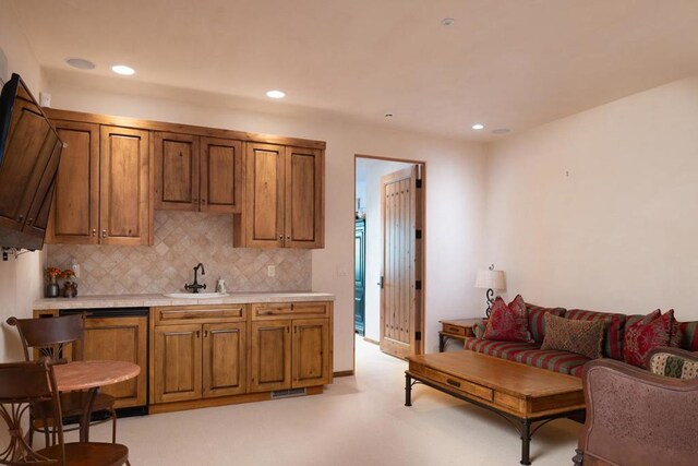 kitchen with decorative backsplash and sink