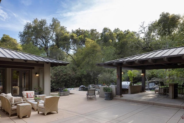 view of patio / terrace featuring an outdoor living space and a grill