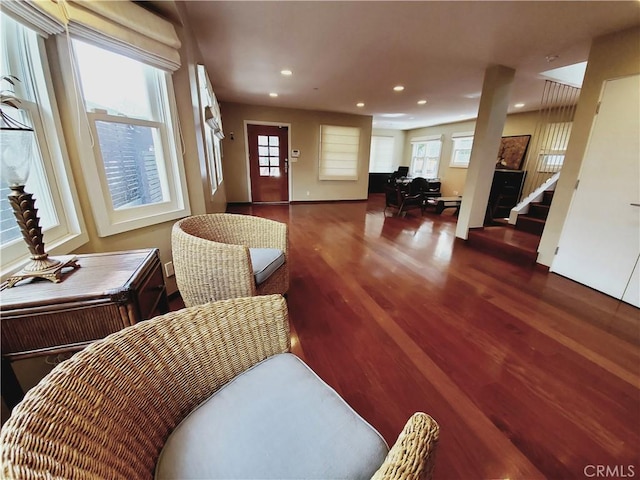 interior space with a healthy amount of sunlight and hardwood / wood-style flooring