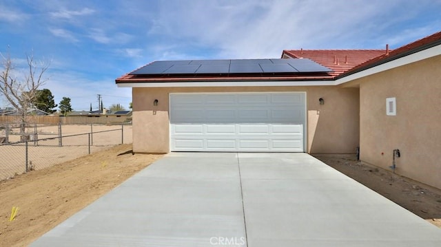 garage with solar panels