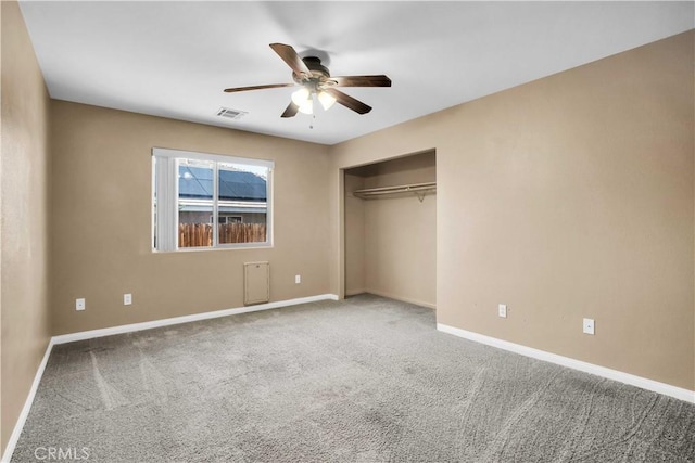 unfurnished bedroom with carpet floors, a closet, and ceiling fan