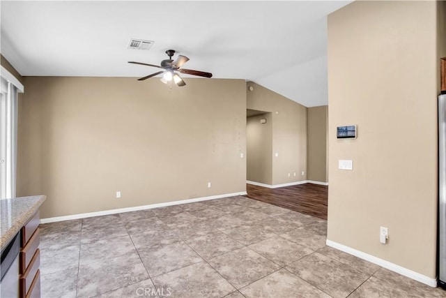 unfurnished living room with light wood-type flooring, vaulted ceiling, and ceiling fan