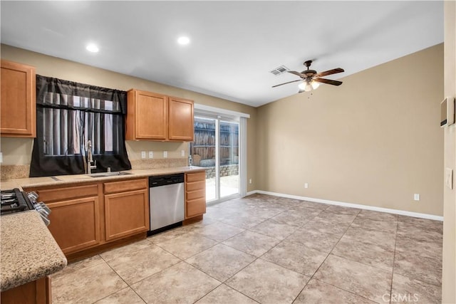 kitchen with stainless steel appliances, ceiling fan, and light tile patterned flooring