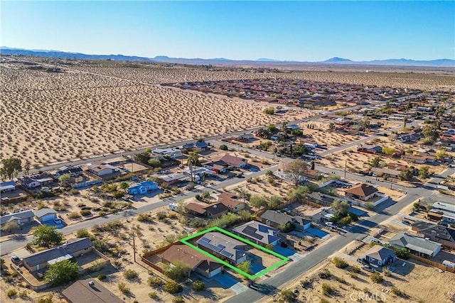 drone / aerial view featuring a mountain view