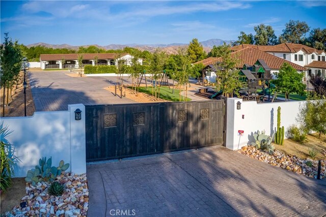 view of front of property with a mountain view