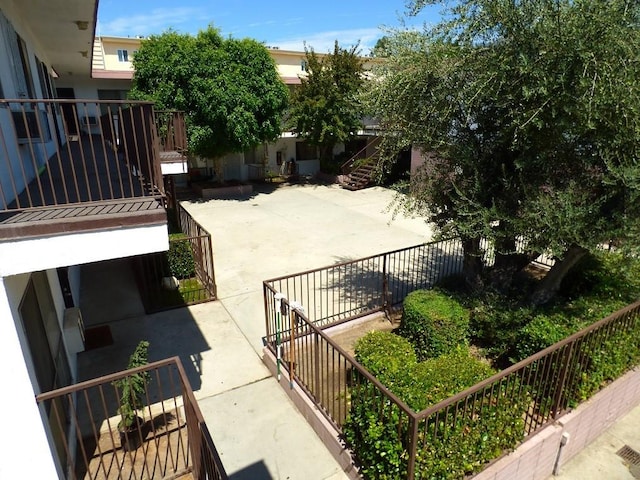 view of patio / terrace with a balcony