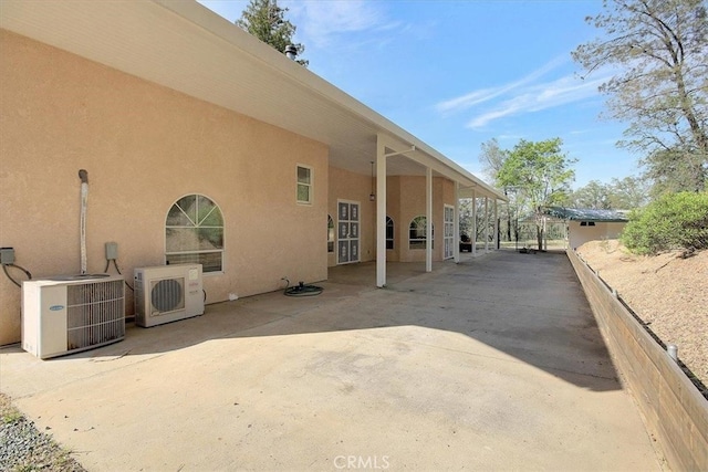 exterior space with ac unit and central AC