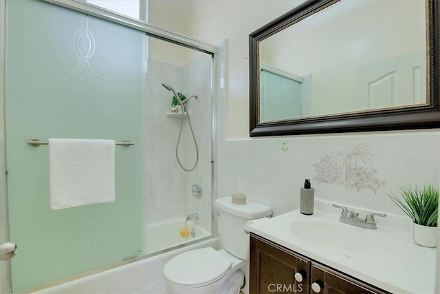 clothes washing area featuring cabinets and washer and dryer