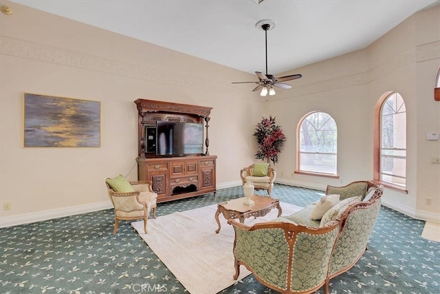 interior space with ceiling fan