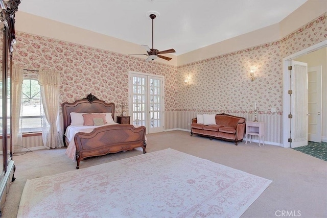 bedroom featuring ceiling fan and light colored carpet