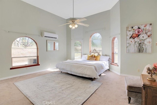 bedroom featuring ceiling fan, light colored carpet, high vaulted ceiling, and a wall mounted AC