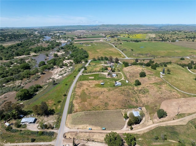 birds eye view of property featuring a rural view
