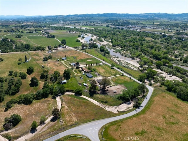 bird's eye view featuring a water view and a rural view
