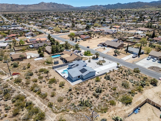 bird's eye view with a mountain view