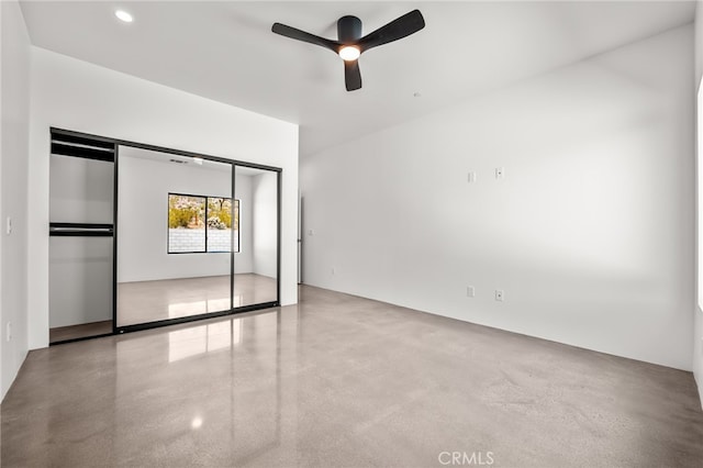 unfurnished bedroom with a closet and ceiling fan