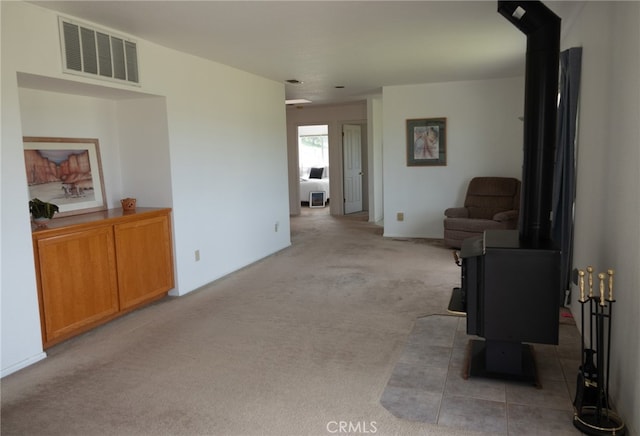 sitting room with light colored carpet