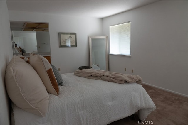 bedroom featuring carpet