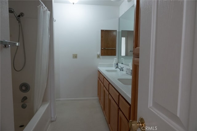 bathroom with vanity and shower / bath combo