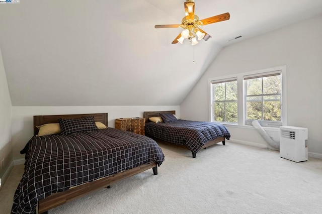 bedroom featuring carpet floors, ceiling fan, and lofted ceiling