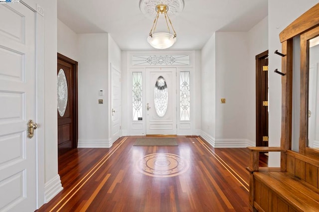 foyer entrance featuring dark hardwood / wood-style flooring