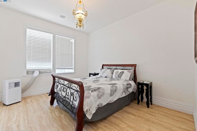 bedroom featuring light hardwood / wood-style flooring