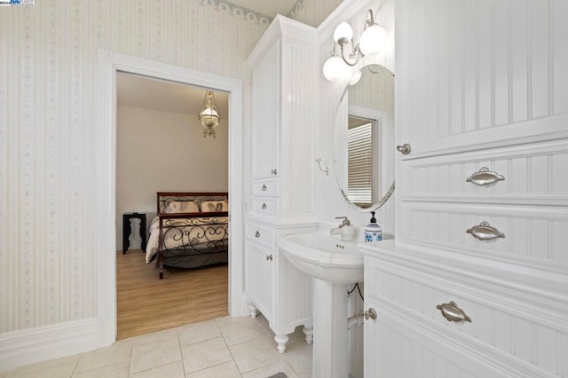 bathroom with hardwood / wood-style flooring