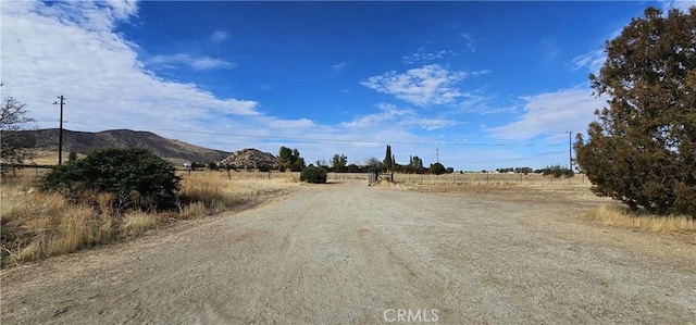 view of street featuring a mountain view and a rural view