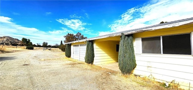 view of home's exterior with a garage